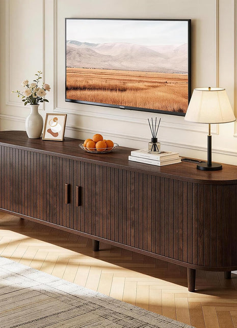 65-Inch Mid-Century Modern TV Stand with Power Outlet, Fluted Entertainment Center with Storage and Adjustable Shelves, Wood TV Console with Sliding Doors in Walnut Finish