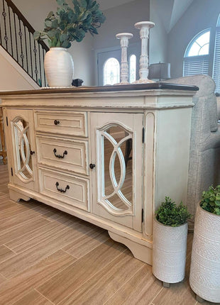 Signature Design by Ashley Realyn French Country Distressed Dining Room Server with Three Drawers and Two Cabinet Doors, Wood Construction, 59" W x 17" D x 36.5" H, Chipped White Finish