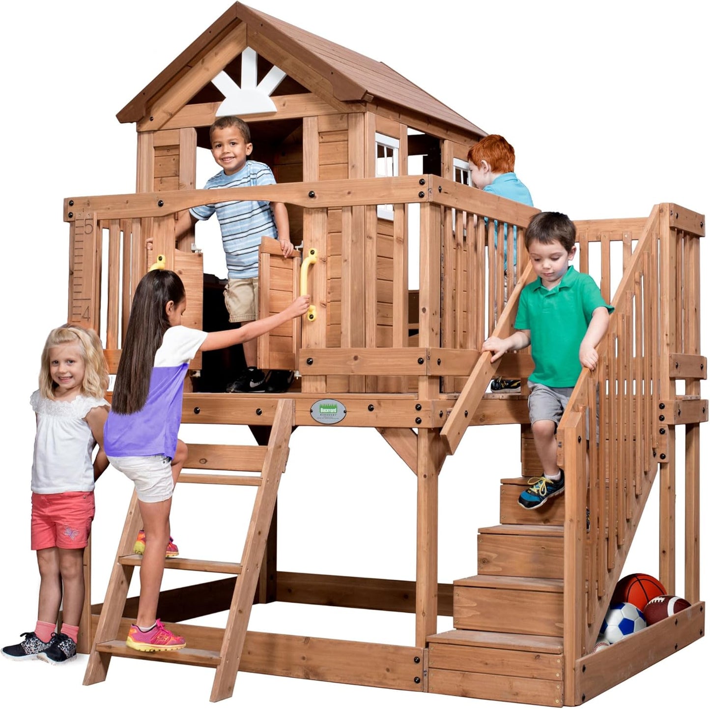 Scenic Heights Elevated Cedar Wooden Kids Playhouse with Play Kitchen, Wrap-Around Deck, Toy Storage Bench, Saloon-Style Doors, Ladder, Stairs, and Growth Chart for Outdoor Play