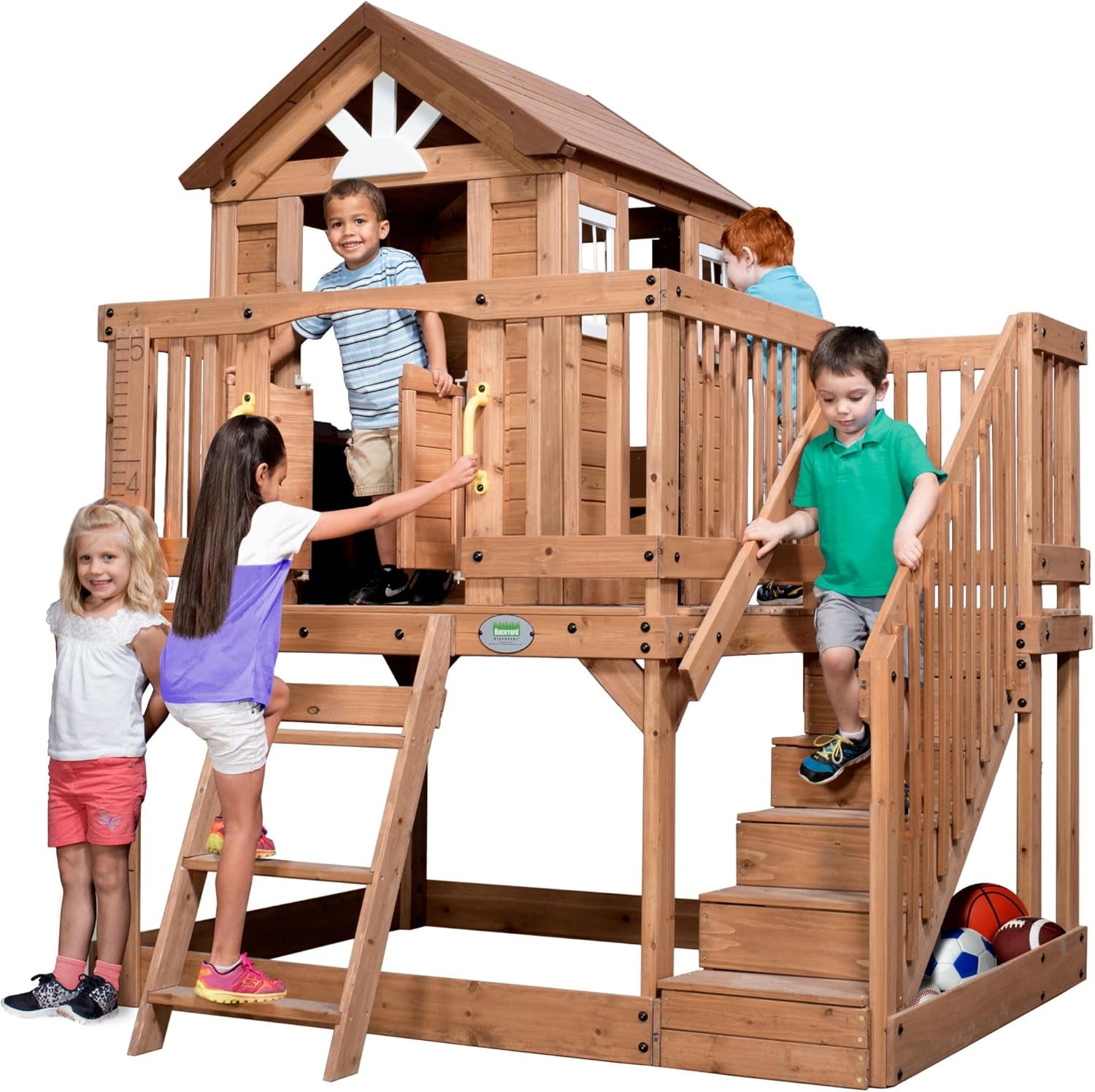 Scenic Heights Elevated Cedar Wooden Kids Playhouse with Play Kitchen, Wrap-Around Deck, Toy Storage Bench, Saloon-Style Doors, Ladder, Stairs, and Growth Chart for Outdoor Play